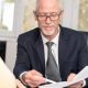 Closing attorney explaining things to woman